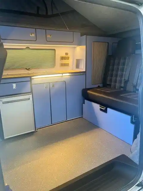 pale blue van conversion interior