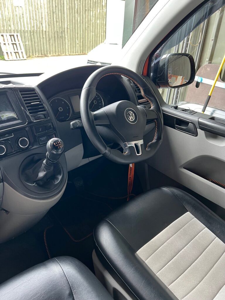 a custom drivers seat of a camper van